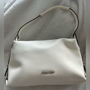 Calvin Klein Fay Demi shoulder bag in white with silver-tone hardware.